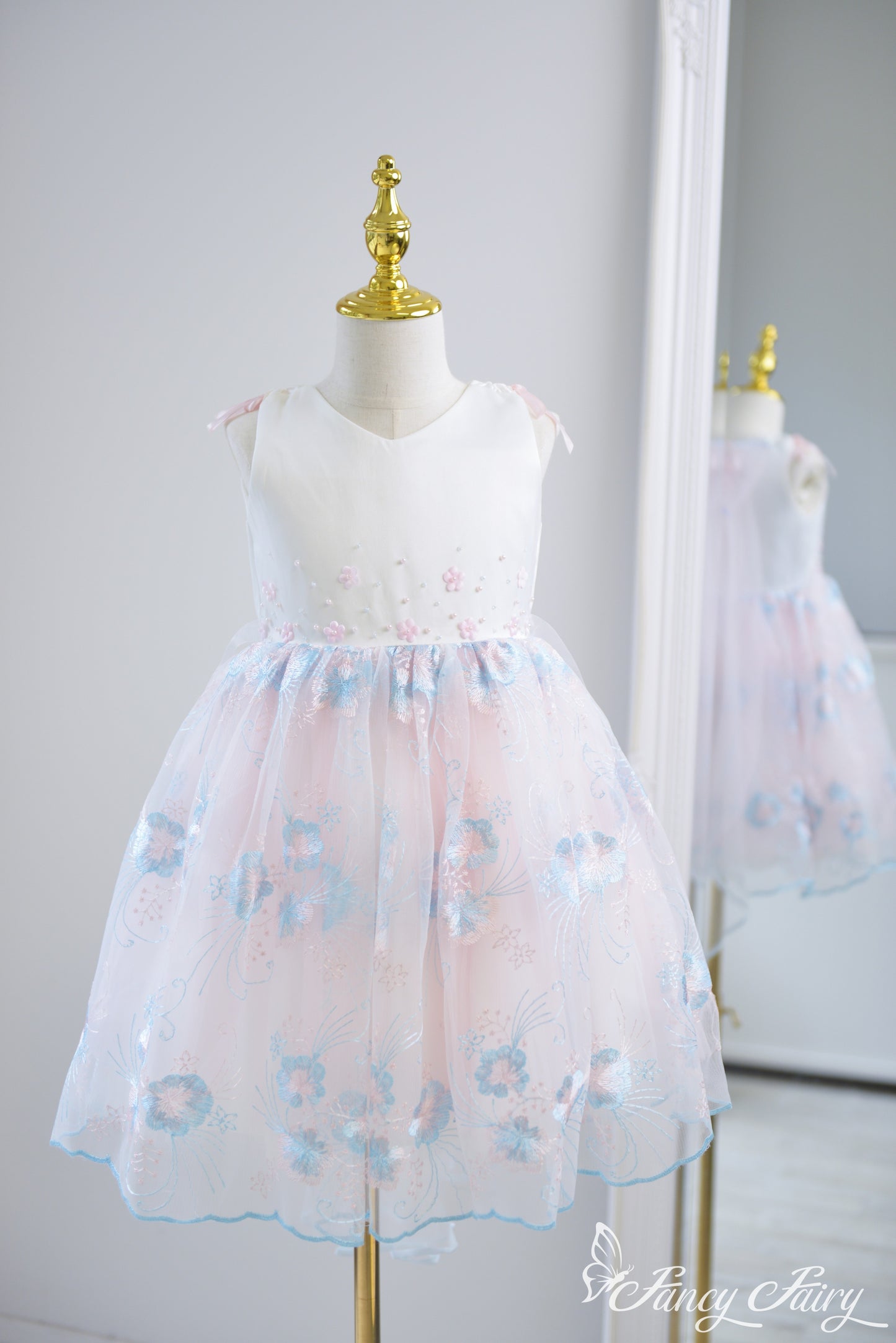 Front view of sleeveless pink and blue girls' dress with floral embroidery and tulle skirt – Fancy Fairy