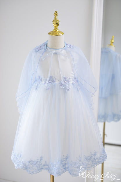 Front view of light blue A-line girls' dress with sheer cape and floral embroidery – Fancy Fairy