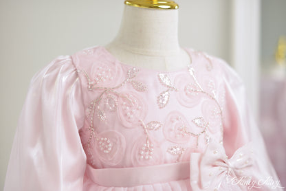 Detail shot of floral embroidery with pearls.